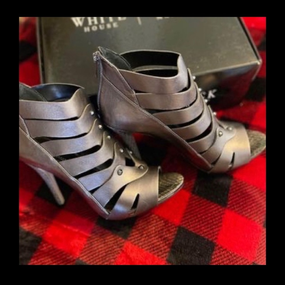 White House Black Market  *New* size 8  style Chandler . Color is Silver